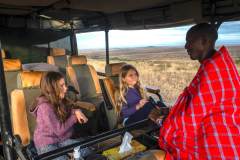 cottars-safaris-family-safari-enock-with-children-in-vehicle