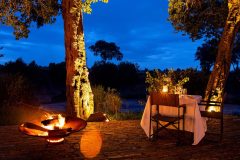 Elewana-Sand-River-private-dining-by-camp-fire