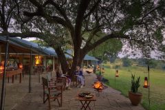 Kicheche-Mara-lounge-exterior-with-guests-1024x576