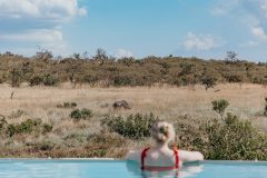 Great-Plains-Sambuk-Suite-at-Mara-Nyika-pool-with-guest