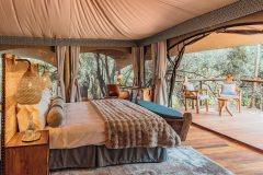 Great-Plains-Mara-Toto-Tree-Camp-guest-suite-bed-with-view