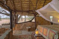 Banda-2-bedroom-and-verandah-over-the-river-at-Saruni-Rhino-3