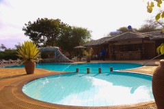 Outdoor-pool-pool-umbrellas-sun-loungers